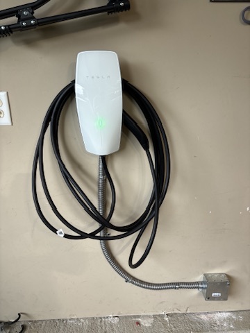 Tesla EV charger installed by Amped KC